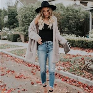 North Pole fuzzy pocketed sweater